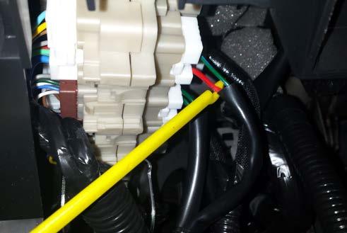 Then reinstall the button panel to the driver's lower dash panel with the 3 screws,