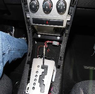 Safety Recall S61 -- Occupant Restraint Controller Page 7 d. Remove and save the two screws in the front of the console (Figure 3).
