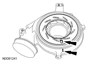 Page 6 of 7 5. Position the unison ring onto the turbocharger vanes, aligning it with the mark on the side of the turbine housing. Verify free movement of the turbocharger vanes and unison ring. 6. NOTE: Position the V-band clamp on the turbine housing prior to assembly of the turbocharger.