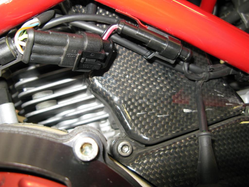 cylinders onto the right side of the bike.