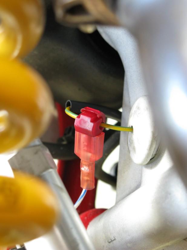 Locate the neutral sensor wire found in the rear engine case.