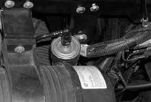 Do not remove the air filter element from the housing unless it is restricting air flow. For machines serial number 009000 and above.