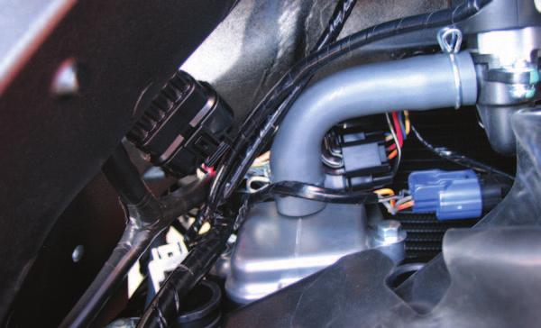 B 7 Plug the CAN termination plug (plastic) into any one of the remaining open ports of the Ignition Module or PCV.