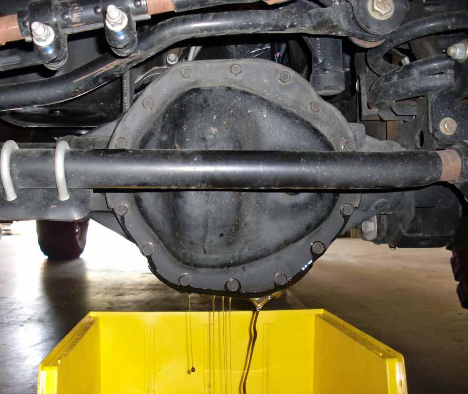 REMOVAL UPPER LOWER Figure A Refer to Figure A for steps 1-4 Step 1: Park your truck on level ground and apply the parking brake. Step 2: Position a drain pan under the differential cover.