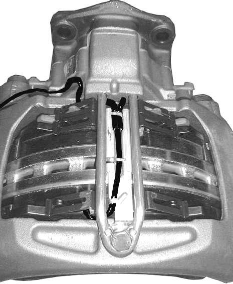 19 Check the correct cable position. Fig. 34 Fit new plug 12 to the opening in the brake caliper! Check and make sure the correct seat!