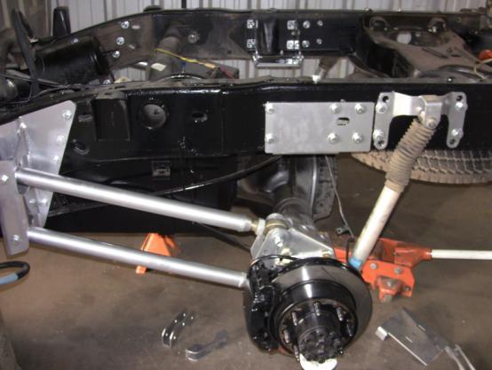 17. Install the 4 link bars between the hangers and axle mounts with the