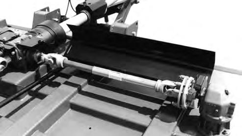 Punch Figure 5-8 Figure 5-10 Cross Shaft Shield Mounting Bracket With Pin N. Install yoke end of jackshaft onto power divider gearbox input shaft.