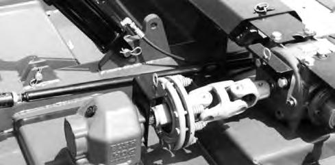 Attach driveline to jackshaft. Q. Attach hose holder rod to tongue using 5/8 x 2 bolt, flatwasher, lockwasher and nut. Plumb hydraulic cylinder as shown in Figure 5-9 (if applicable).