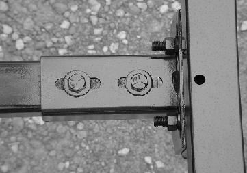 carriage bolts (Fig. 17) on each bracket located at the end of each guide tube. 2.