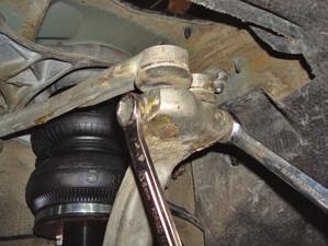 Reattach the upper control arm ball joints to the steering knuckle (fig. 33).