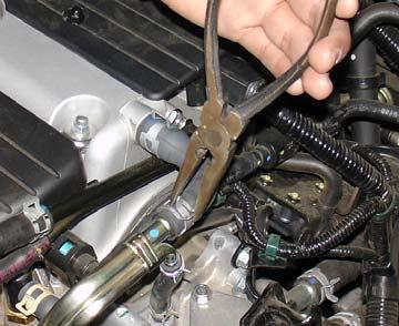 remove all three bolts from the air intake box.