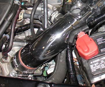 Tighten the power-band to over the throttle body to secure