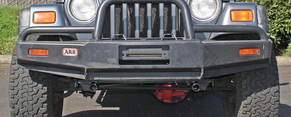 The bracket consists of a main receiver brace, two removable front braces, and a hardware pack. The main receiver brace mounts to the frame rails.