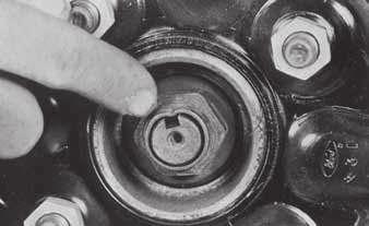 Use a wrench or jack handle to take off wheel hub nuts. Pull straight back to remove the wheel and tire. 5.