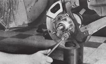 Chrysler models only Bearing/seal removal 1. Whenever the hub is removed, service procedures require that a new bearing is installed. 2. Using a suitable tool, remove the hub from the knuckle.