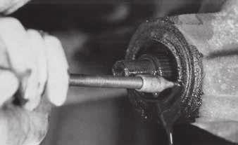 8. Mark the pinion yoke and shaft to identify correct position for reassembly. Remove the pinion yoke. 9. Use a seal puller or suitable tool to pry out the old seal (ig. 41).