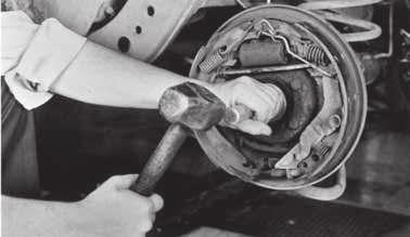 ) The bearing is at proper depth when it contacts the bearing seat in the axle tube. Be sure the bearing is seated squarely not cocked against the shoulder. 4.