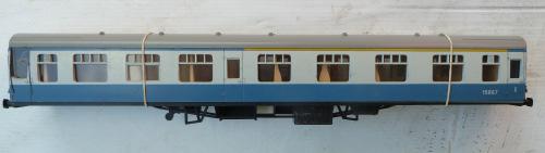 1.346 Other non-hornby 0-gauge Coaches - Italy/U.K. Lima plastic-bodied Side Corridor Coach, with interior partitioning. Re-finished in unlined Southern green lettered 'Southern 1st/3rd'. Grey roof.