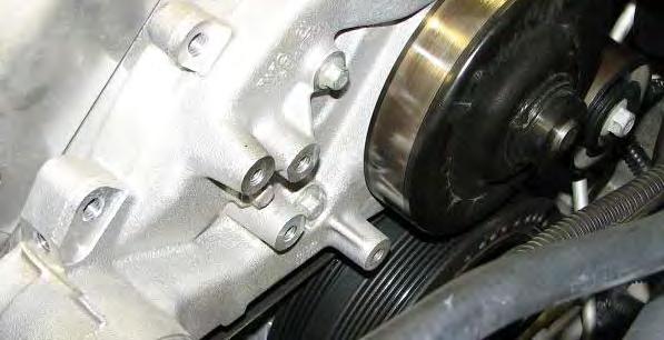 55. Use a 10mm socket to remove the three bolts on the passenger side of the water pump. 58.