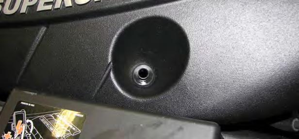 Locate the supplied coil cover brackets on top of the ignition coils then reinstall the ignition coil bolts. 113. Use a 10mm wrench to remove the valve cover ball stud from the driver side cover. 114.
