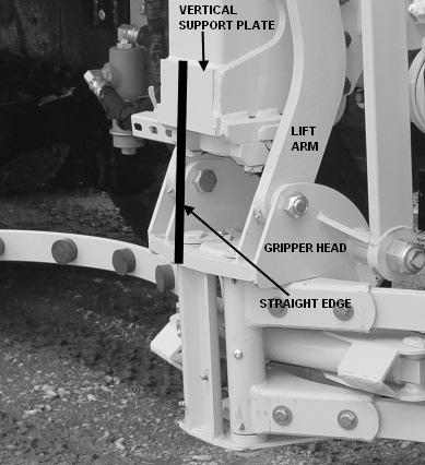 SECTION THREE MAINTENANCE ADJUSTMENT OF ARM CHAIN PROCEDURE Initiate Lockout/Tagout Procedures. 1.0 Retract (lower) the vertical cylinder (arm raise or lower) completely. 2.