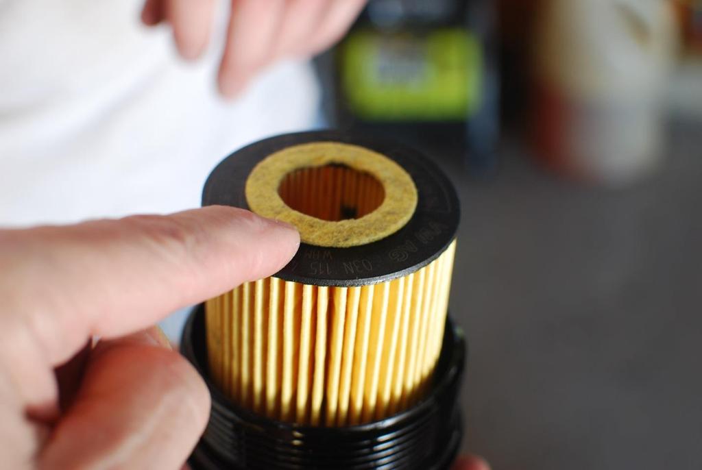 The filter clicks into the cap. The top is a felt-like substance.