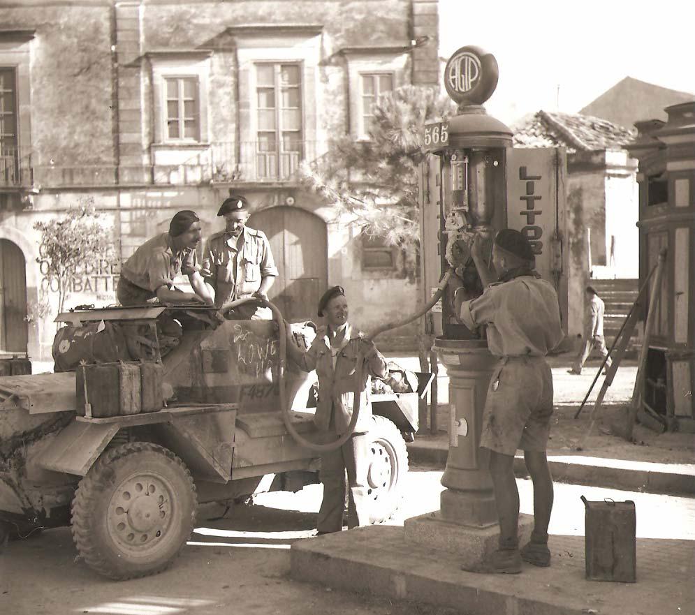 image courtesy of the IWM NA 4555 5 th Army in Italy, Photographer: War Office official photographer Description: Troopers of the Royal tank Regiment refeul there scout car numbered F48707 before