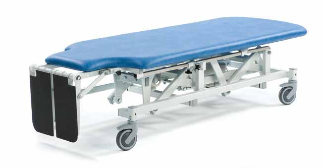The standard models include the adjustable work table which is an option on economy models. All models are supplied with individually adjustable foot boards, patient handgrips and harnesses.