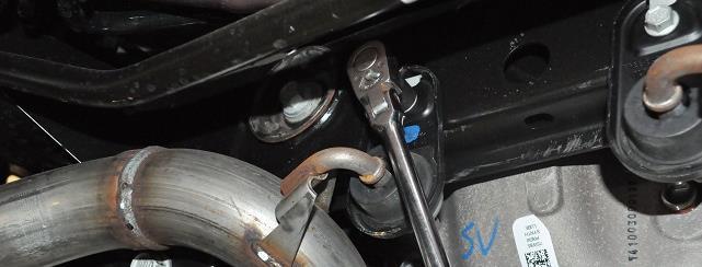 Use a 3/8 drive ratchet and 15mm deep socket, to loosen the two sleeve clamps at the cat-back connection point. Both nuts must be loosened in order for the clamp to fully disengage.