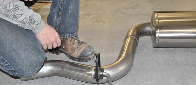 CORSA EXHAUST 5. Locate the passenger side hanger grommet from Removal Step 5 and the passenger side muffler.
