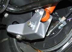 Auto & Air Ride Models: Locate the new Skyjacker rear shock relocation brackets. Attach the bracket to the OEM shock location using the 9/16" x 3 1/2 fine thread bolt, washers, & nut.