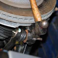 adjusting bolt. Apply a small amount of lubricating grease to the puller threads & the puller shaft-to-adjuster arm contact point.