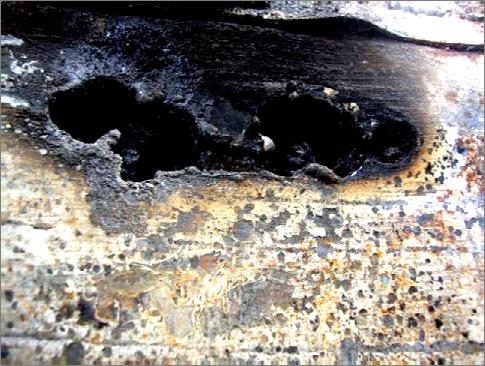 It was determined that some of the battery connections had melted off during the fire energizing part of the battery