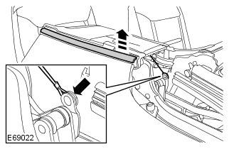 Page 3 of 15 8. Release the convertible top lid seal. Release from the 2 clips. 9. Release the front safety belt lower anchor.
