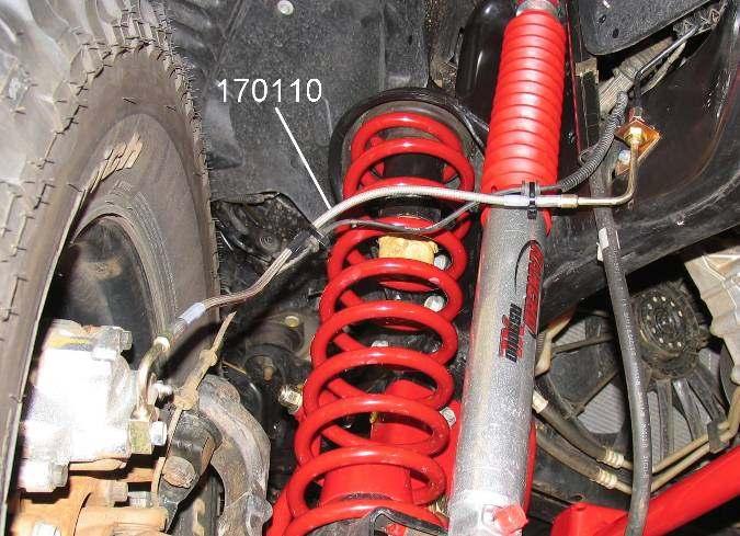7) Slide grommets on ABS wire to provide slack for full suspension/turning movement. Reattach ABS wires to brake lines.
