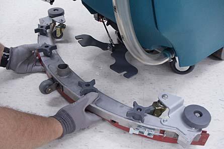 ATTACHING SQUEEGEE ASSEMBLY FOR SAFETY: Before leaving or servicing machine, stop on level