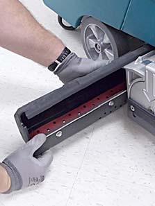 11. Wipe the squeegee blades clean (Figure 67).