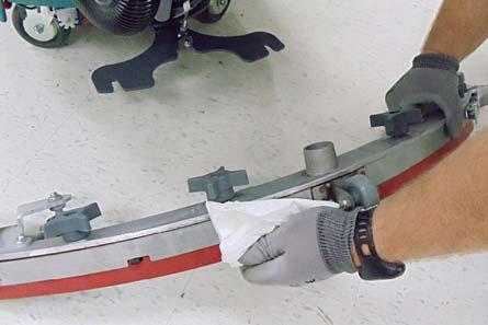 Rotate blade if worn (See SQUEEGEE BLADES).