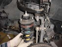 inner CV Axle joint, move the spindle/hub assembly