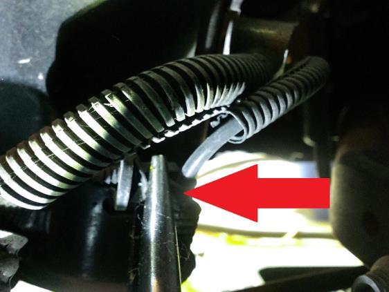 Step 3. Pull wheel sensor clip from behind the shock.