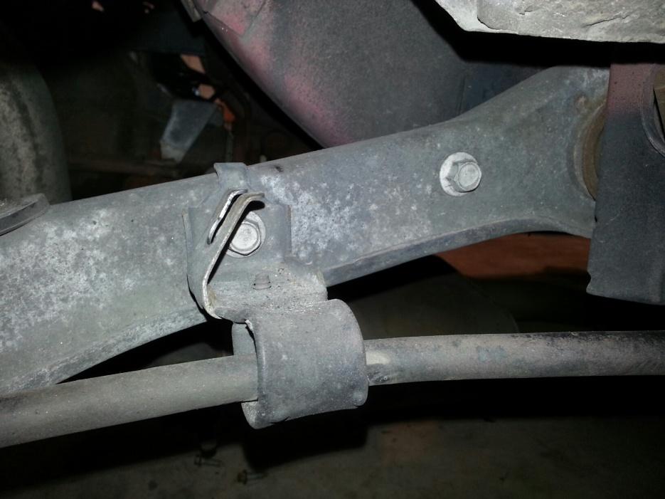 Remove the rear sway bar using a 13mm socket with 6 extension. There are two bolts per side. 4.7.