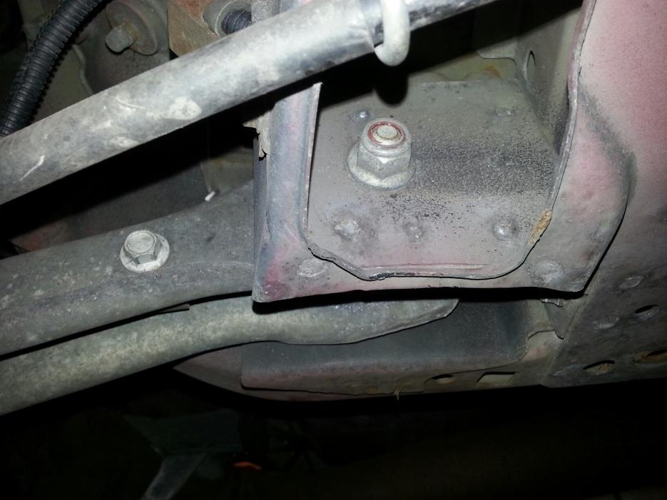 4.13. Remove the front control arm bolt using 18mm deep socket and 3/4 wrench. 4.14.