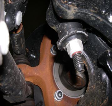 (NOTE: The realignment of center pin may require slight loosening of opposite side U-bolts.) 14. Install the anchor plate and the new U-bolt hardware. Torque U-bolts to specs. 15.