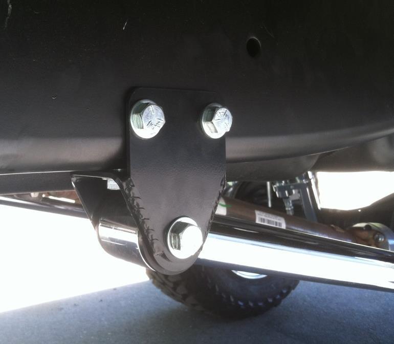 16) Install the FTS traction bars with the 9/16 x 4 ½ bolts supplied and tight to 95 ft.-lbs.