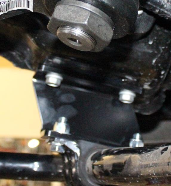 43) Install the sway bar brackets as shown using the factory