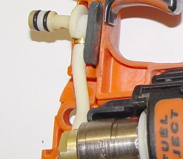 27. Note the position of the Fuel Connector, Fuel Hose and black Fuel