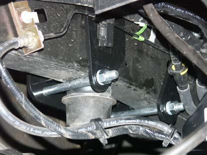 The brake line bracket on the driver side must be pried out of the frame in order to install the