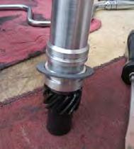 Using a large crescent wrench turn the balancer tool clockwise until the