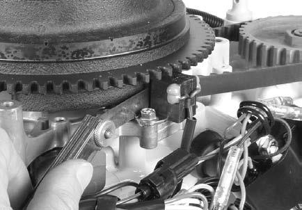 Clean flywheel and crankshaft mating surfaces with cleaning solvent. Install: Flywheel key Flywheel Flywheel washer and nut Clean mating surfaces and torque flywheel nut to 50.5 ft. lbs.