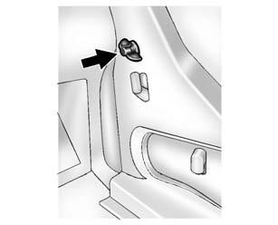 10-26 Vehicle Care 2. Remove the convenience net (if equipped). Unhook the net from the upper wing nut.